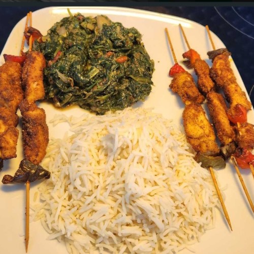 Rice with veggie sauce & kebabs